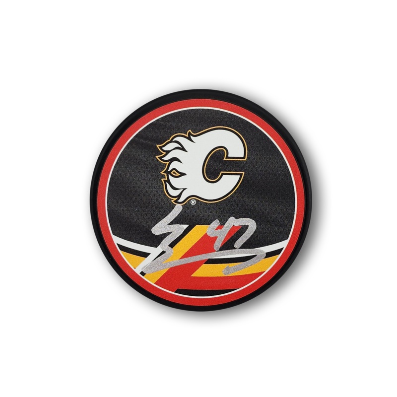 Connor Zary Autographed Calgary Flames Reverse Retro Hockey Puck