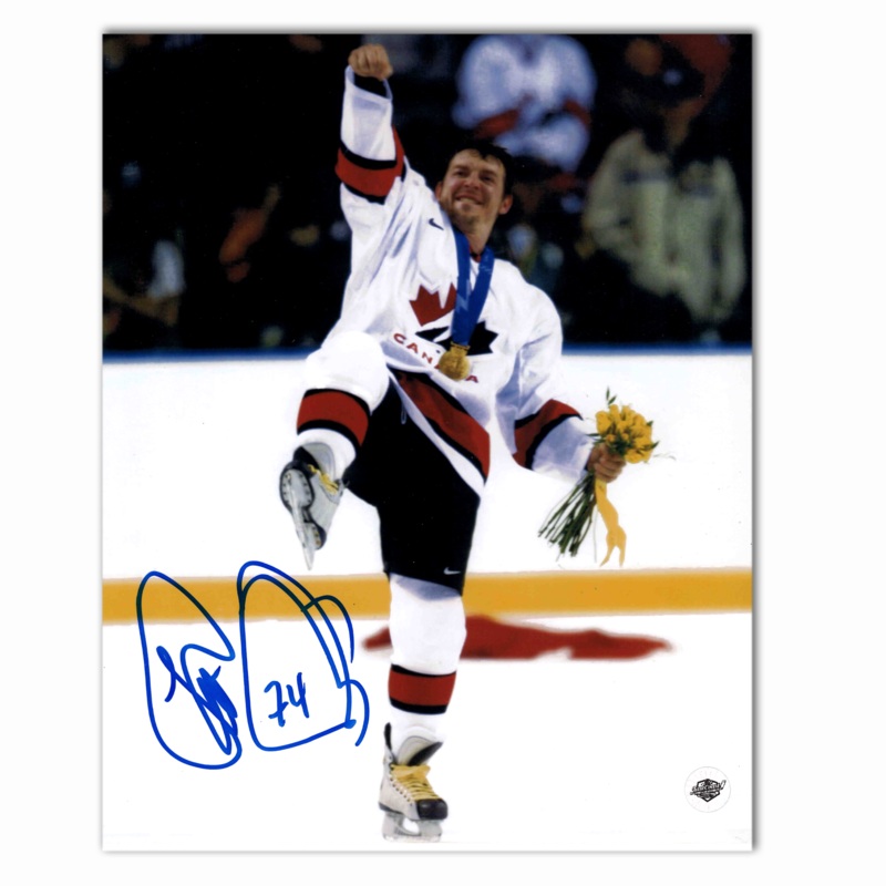 Theo Fleury Autographed Team Canada 8×10 Photo (Celebration)