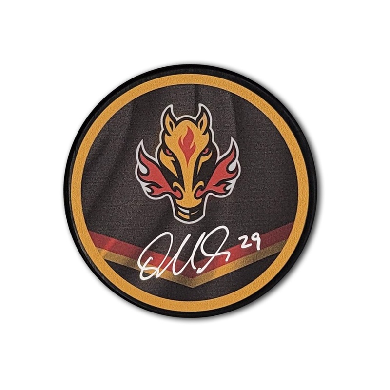 Dillon Dube Calgary Flames Reverse Retro Autographed Hockey Puck