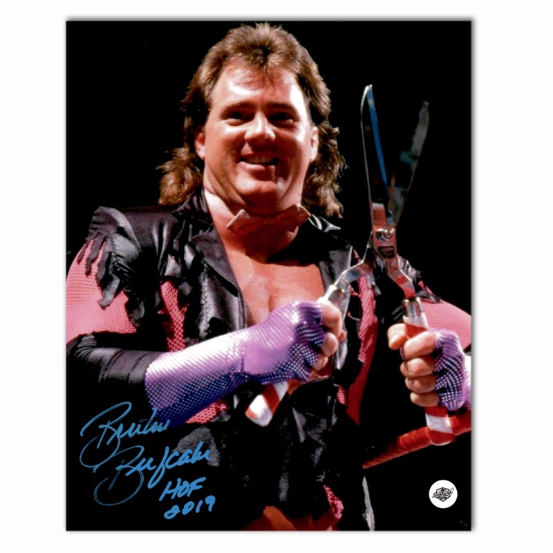 Brutus Beefcake Autographed WWE 8×10 Photo (Holding Sheers)